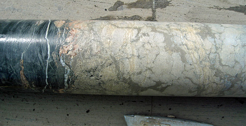 A short section of core from the lower part of borehole.  Nodular anhydrite (off white) and gypsum (pink) from a thick bed.