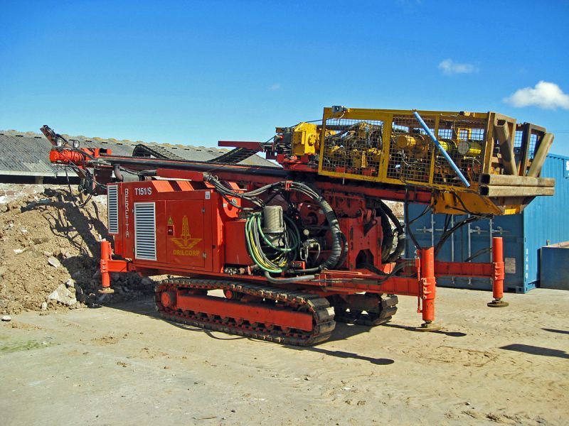 Drilcorp's Beretta T151S track-mounted, top-drive drilling rig arrives on site.